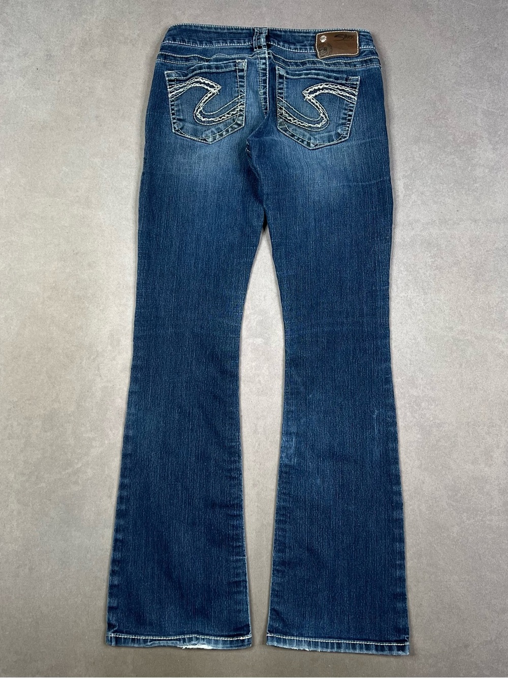 Silver Jeans Women's Blue Flare Jeans with Embroidered Back Pockets